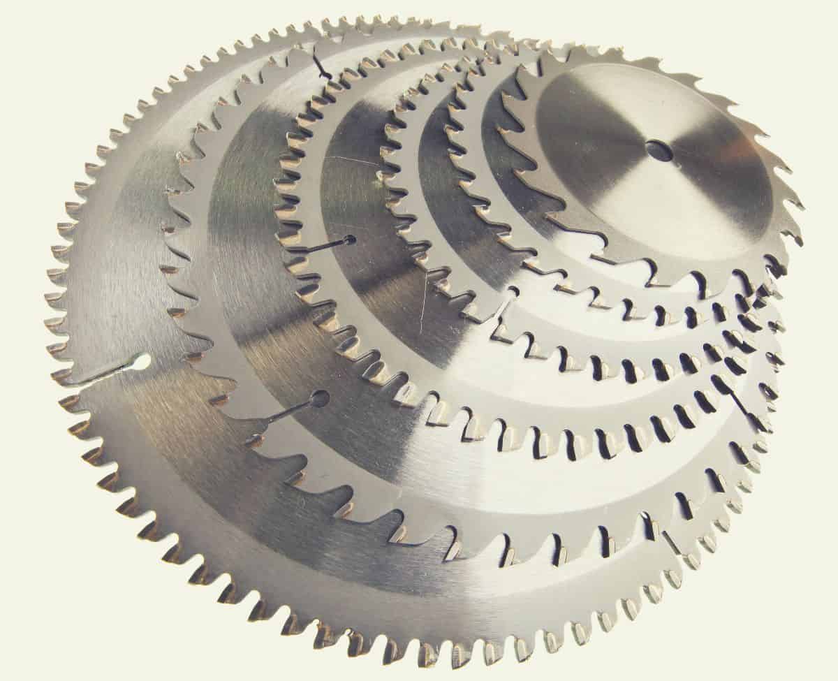 A pile of circular saw blades of various sizes